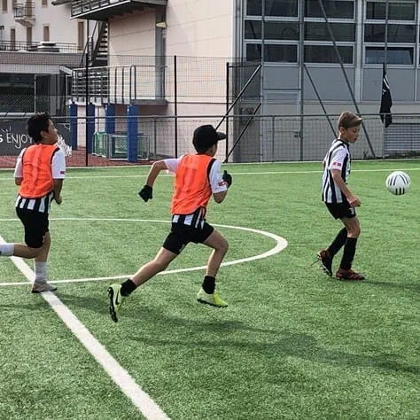 Boys playing football
