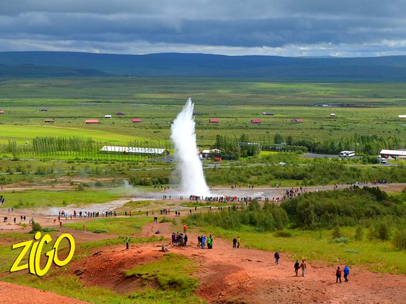 A geyser erupting in the Geysir area