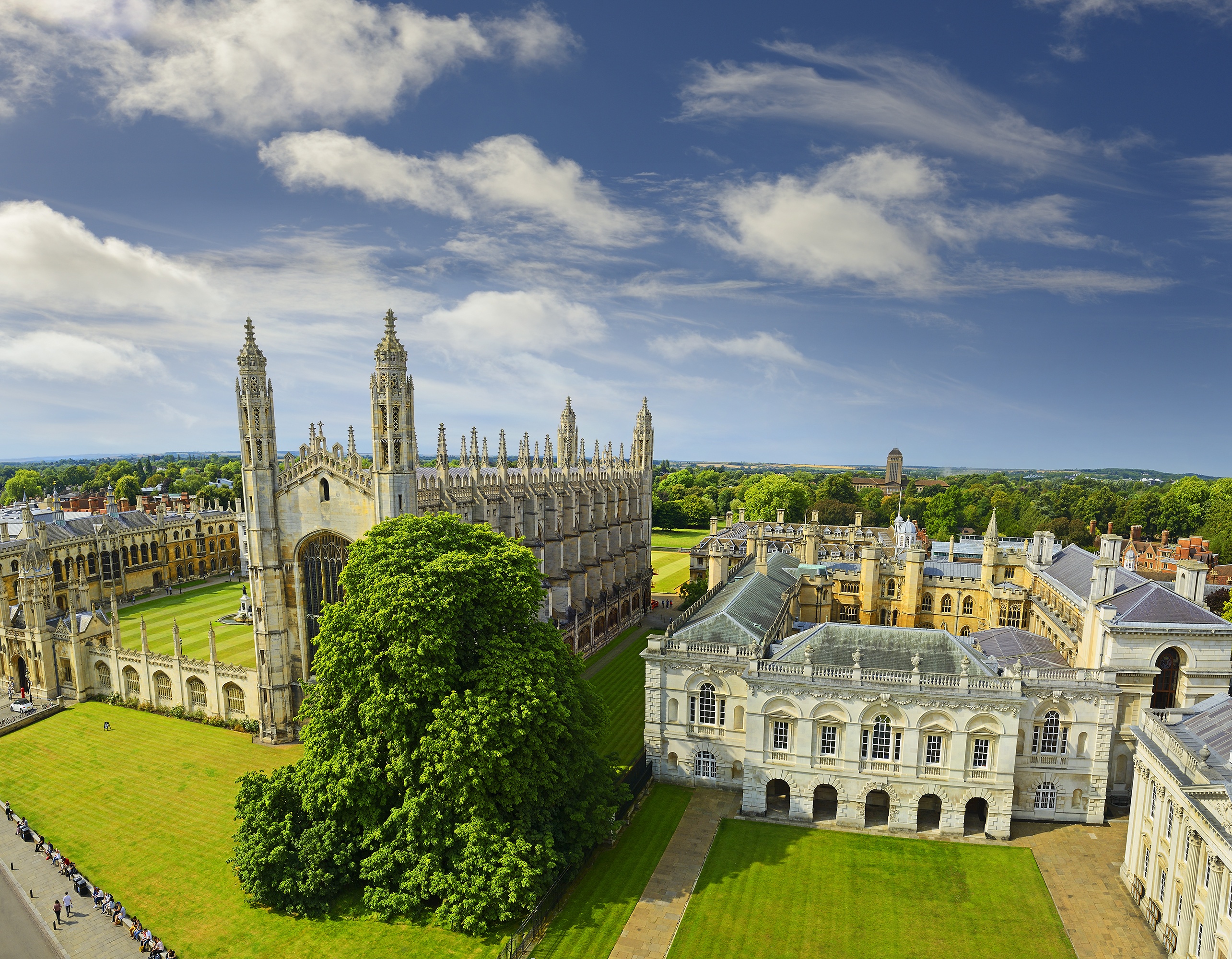 Aerial view of the Cambridge colleges and chapel surrounded by lawns and trees