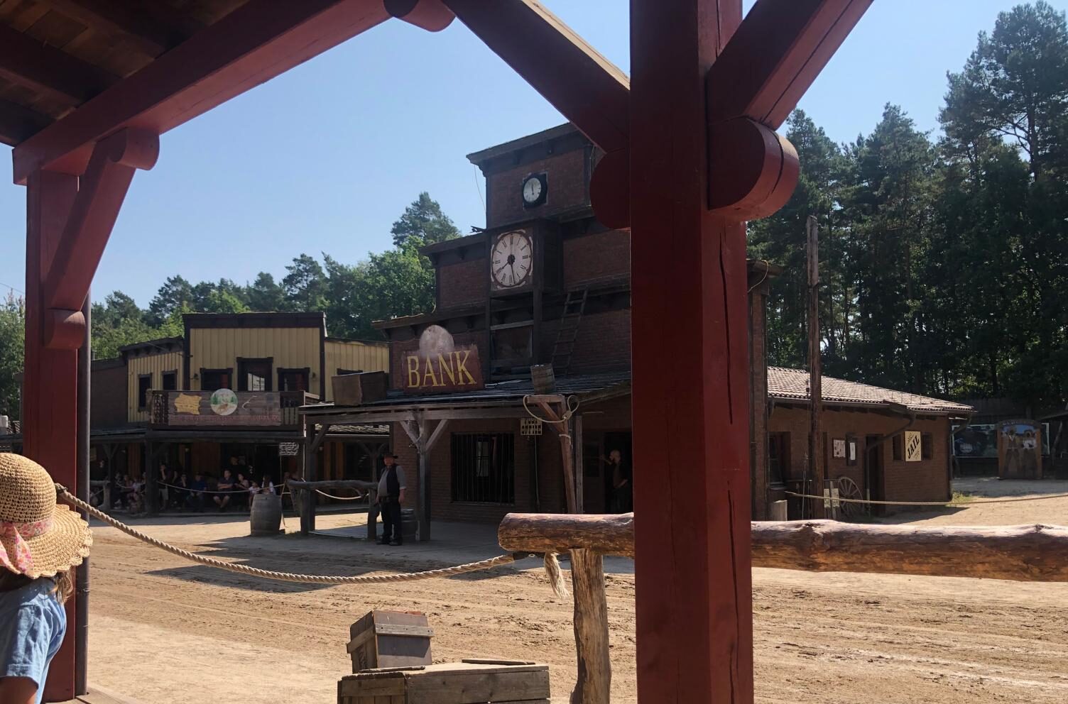 Wooden saloon and bank buildings on the main street of the El Dorado western town near Templin, the camp's excursion destination