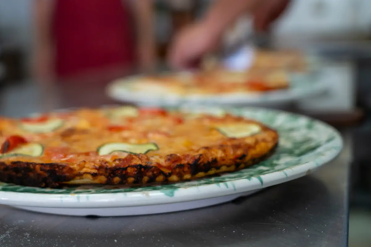A pizza served on a plate
