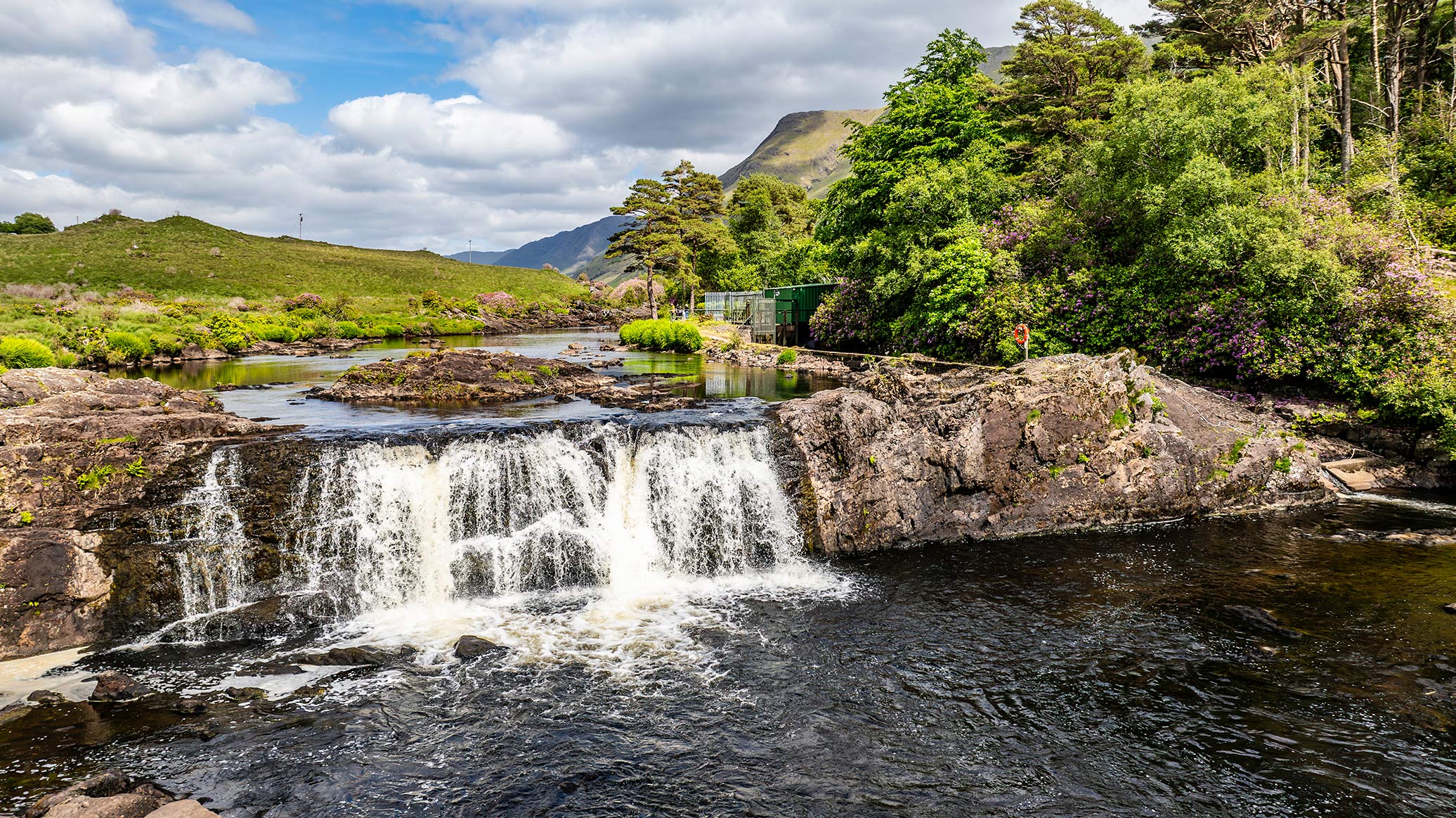 Waterfall and river pool in the Connemara landscape around Delphi Resort