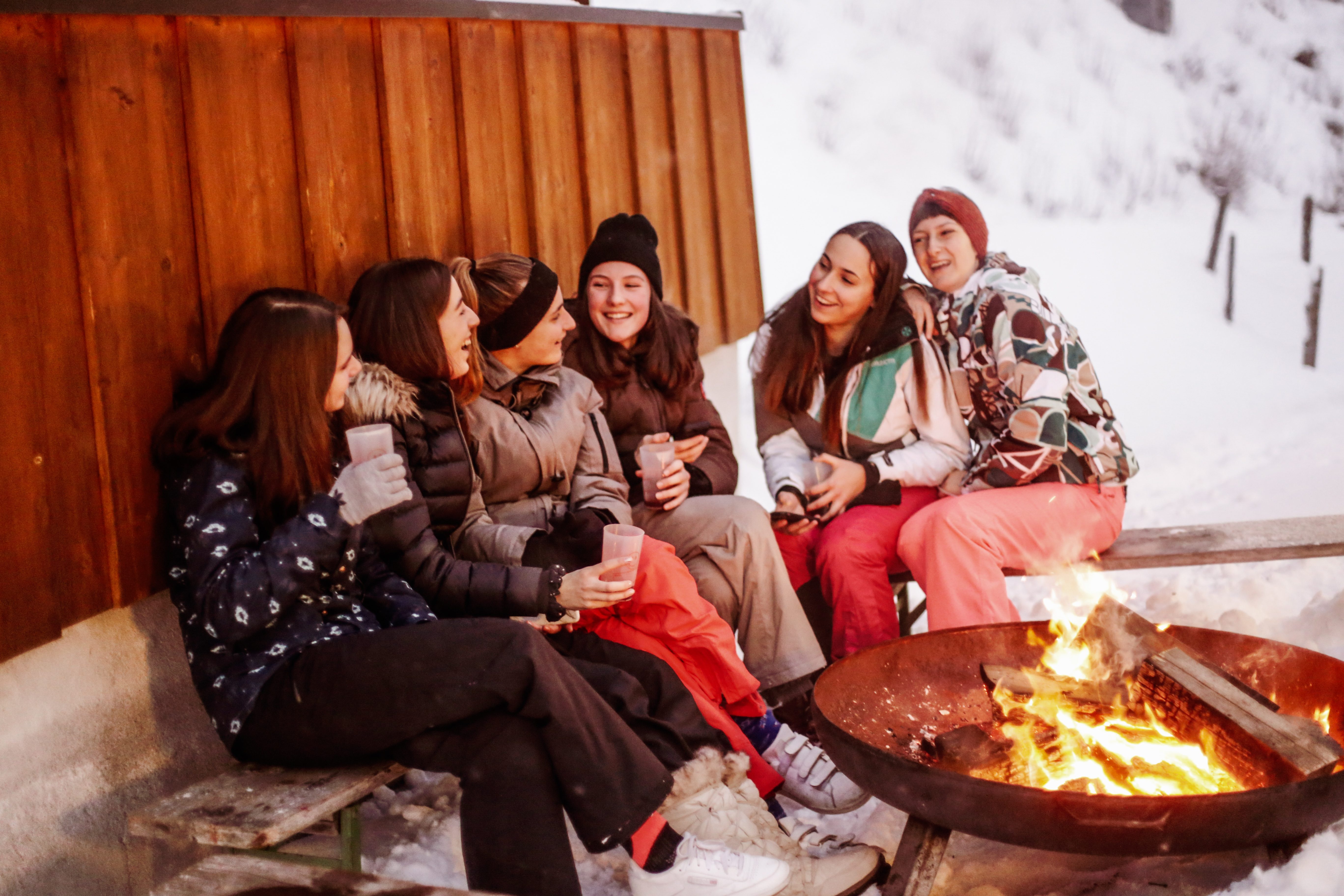 ruf guests around a campfire