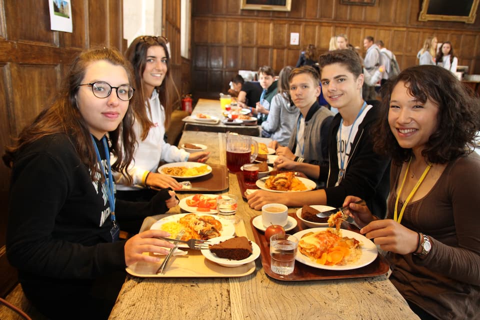 Students having lunch in College Hall at Winchester