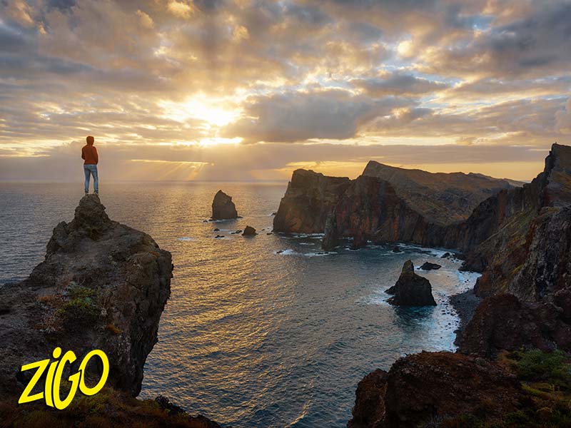 Cliffs and sea stacks at sunset above the Atlantic