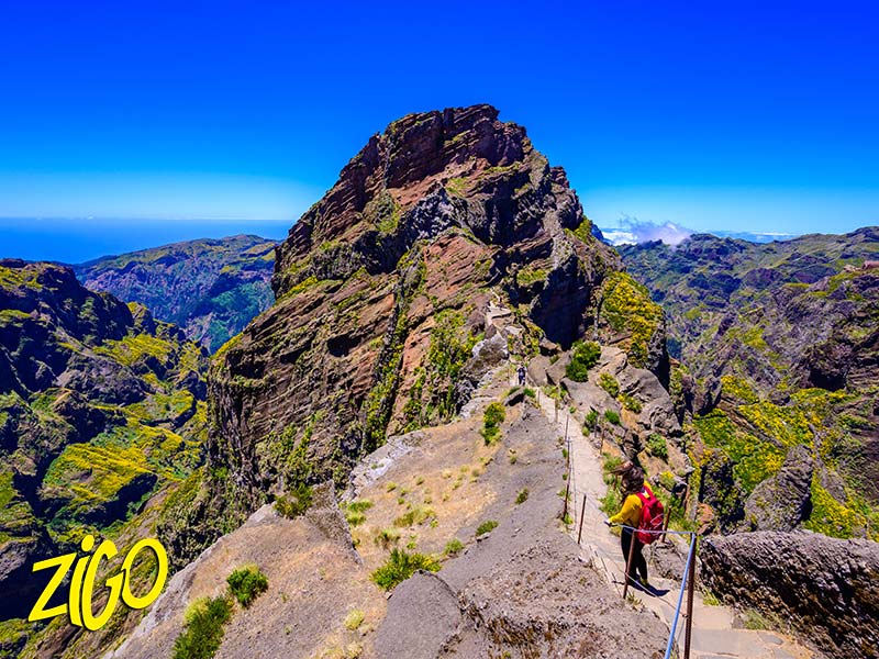 Walkers on a volcanic ridge path in the island interior