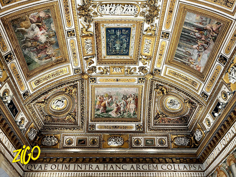 Painted and gilded vaulted ceiling of a Roman gallery, frescoed panels framed in stucco