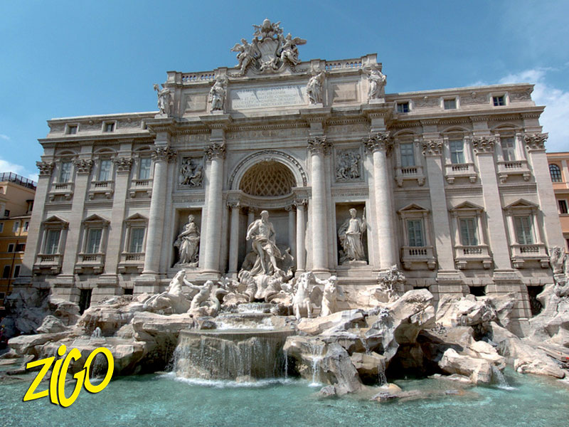 The Trevi Fountain in Rome, its sculpted figures and basin seen from the square