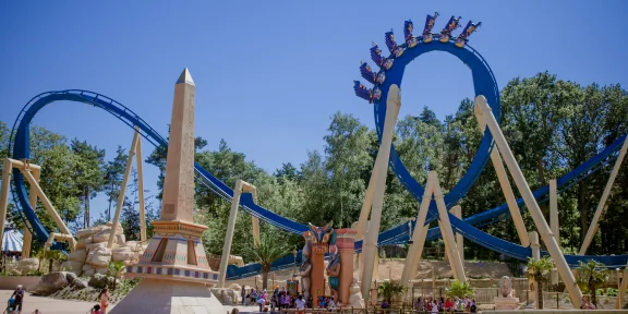 Looping roller coaster beside the park's Egyptian-style obelisk