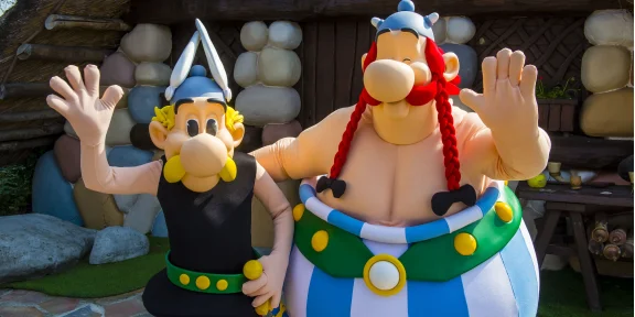 Two giant costumed Gaulish mascot figures at the theme park