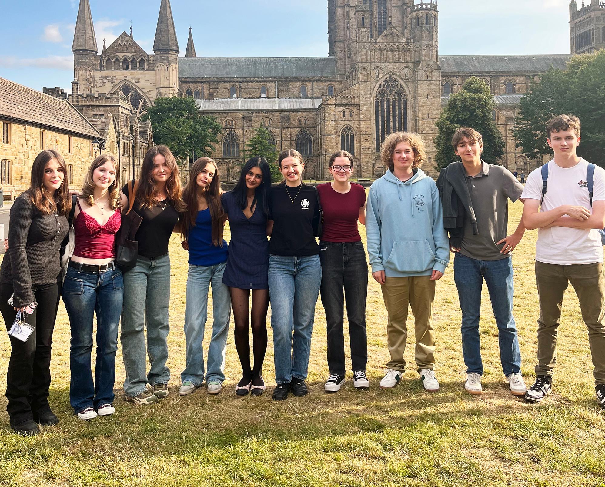 Group of teenage students in front of Durham Cathedral