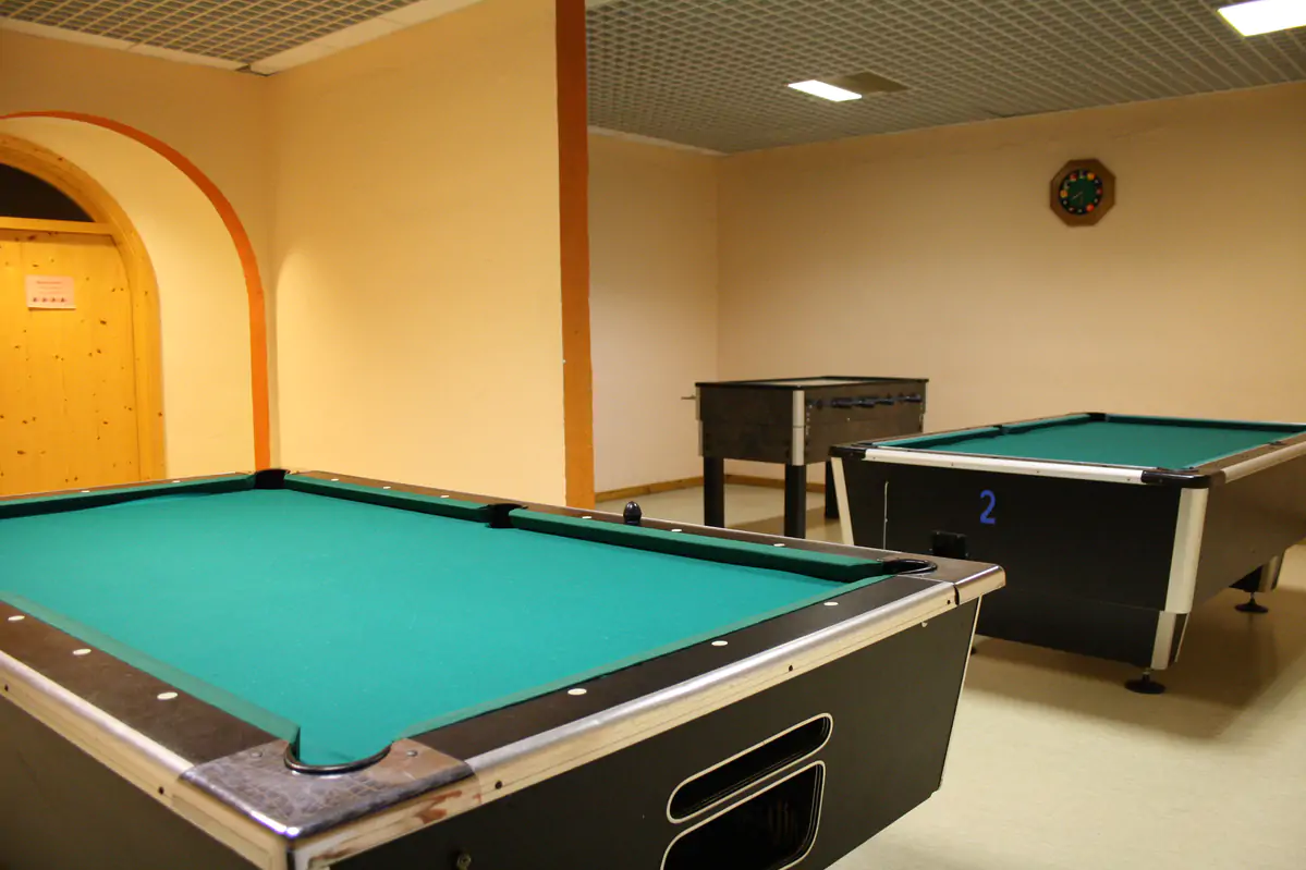 Billiard table and table tennis table in the games room