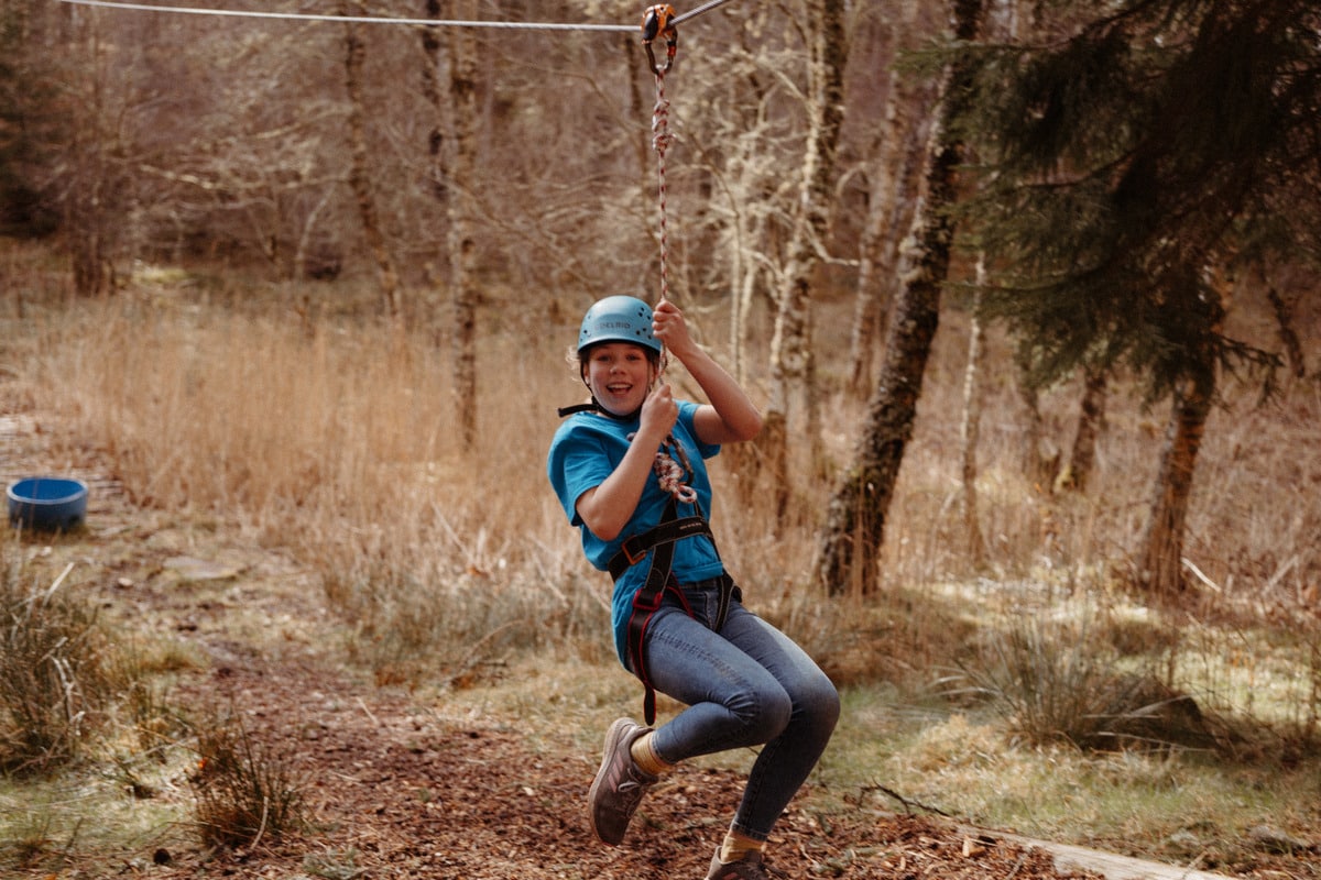 An outdoor activity session on the Abernethy Nethy Bridge site, Scottish Highlands