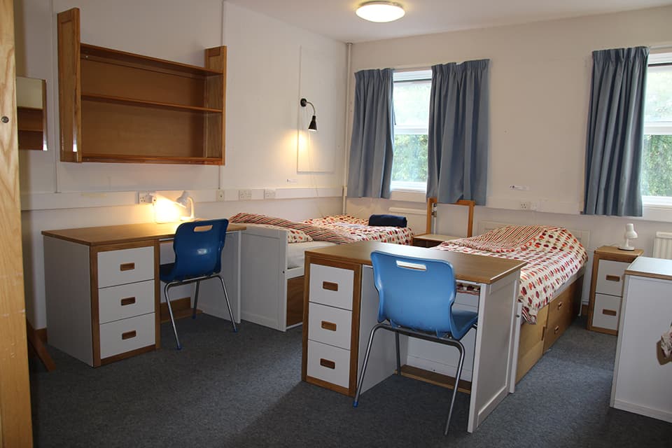 Shared bedroom with single beds in a Benenden School boarding house