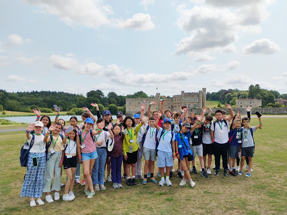 Students on an excursion in front of Leeds Castle in Kent