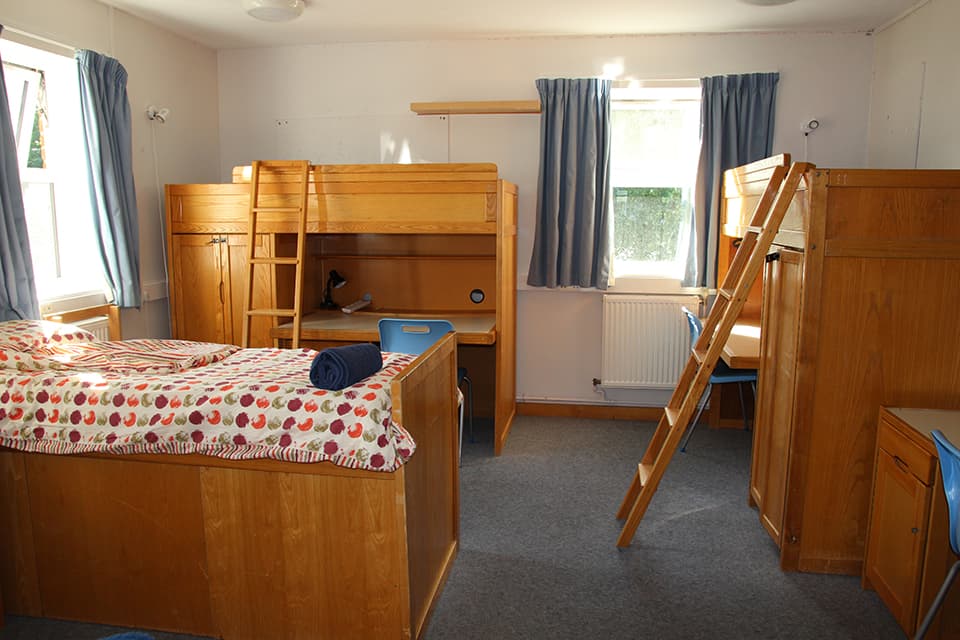 Shared bedroom with single beds in a Benenden School boarding house