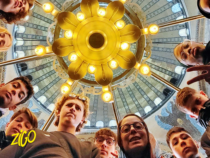 Participants beneath the dome of a historic monument in Istanbul