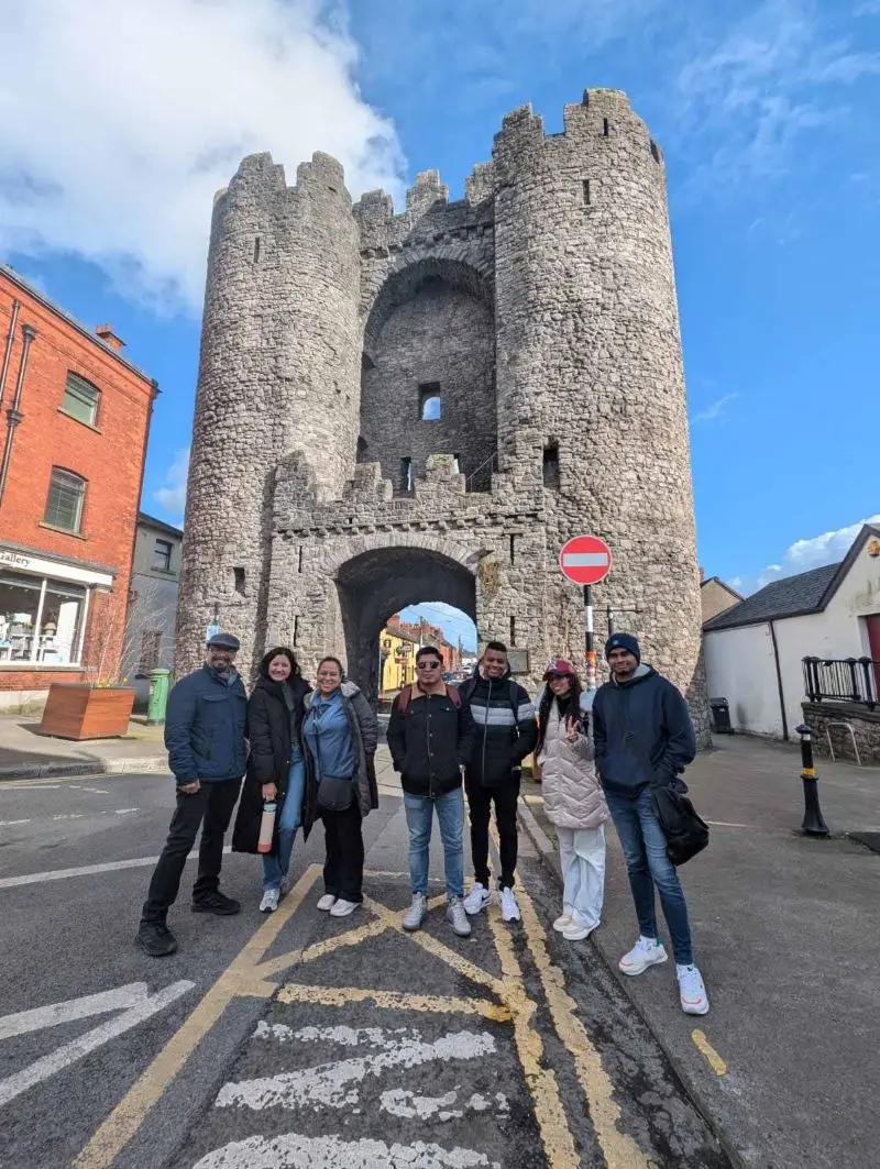 Camp students in front of Saint Laurence Gate, the medieval barbican in the centre of Drogheda