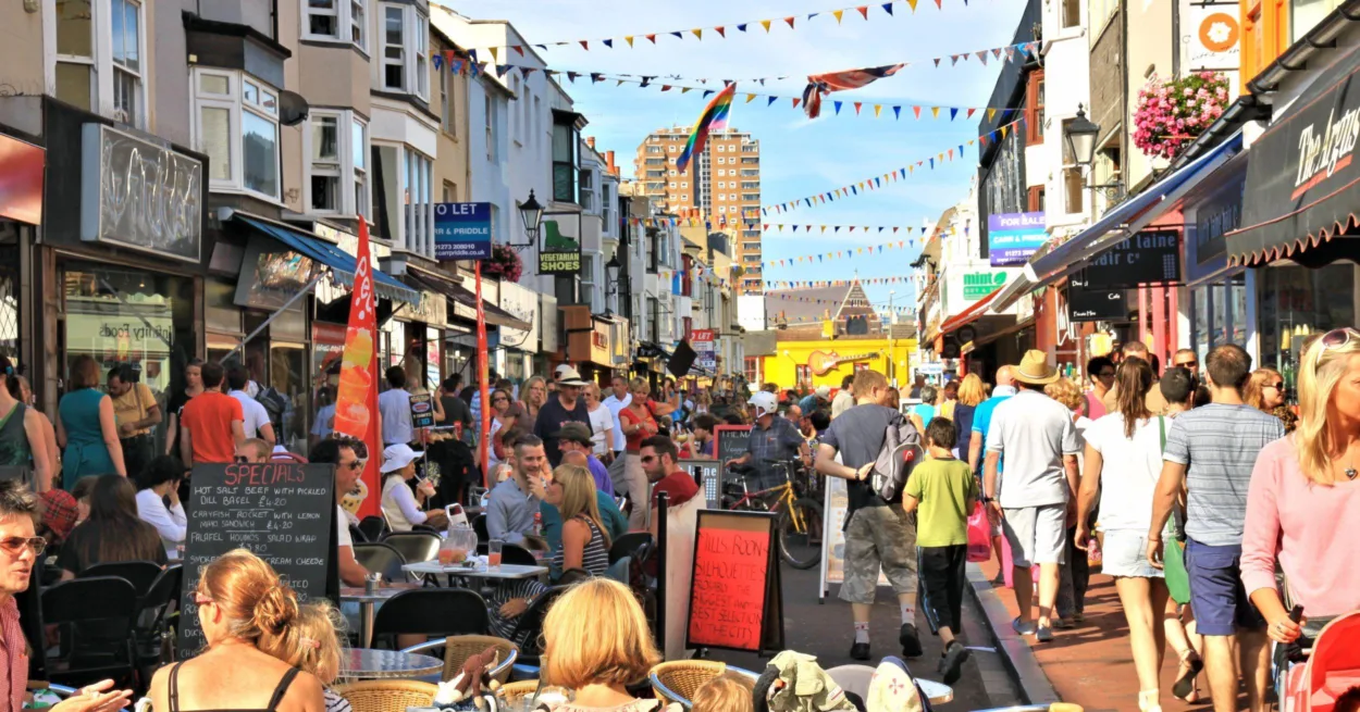 A photograph of Gardner Street in Brighton where the road has been pedestrianised and is lined with independent shops.