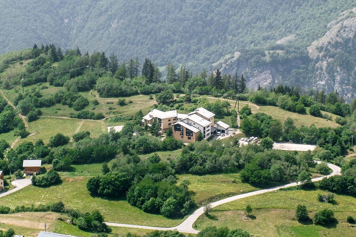 Aerial view of the Chalet l'Alpestre and its wooded park