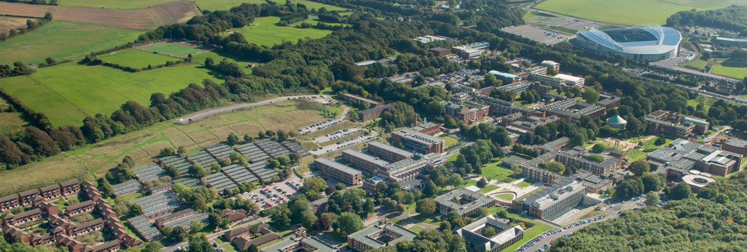Aerial view of the University of Sussex campus and the surrounding countryside, where the Brighton tennis camp is held