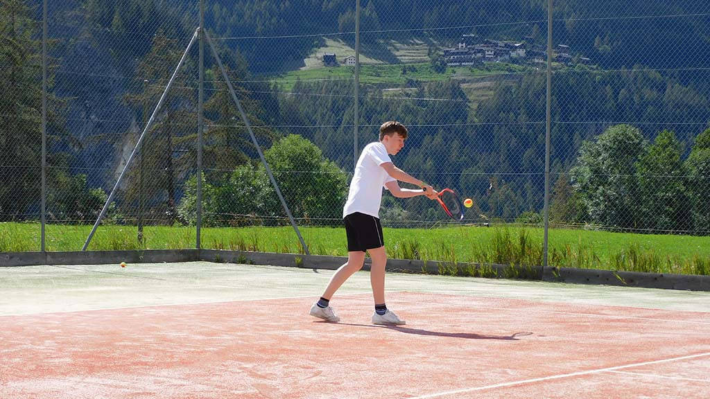 Tennis practice session in the Valais Alps