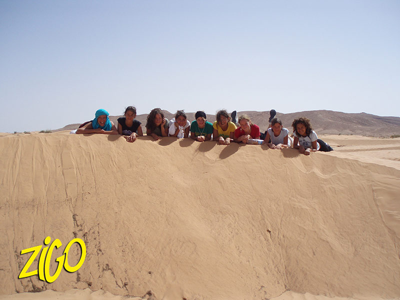 The group along the crest of a dune in the Sahara