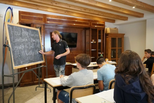 Native-speaker teacher with the group