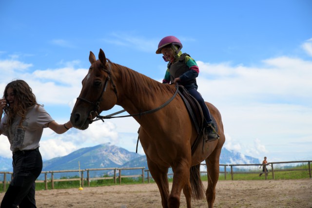 Horse riding with an instructor
