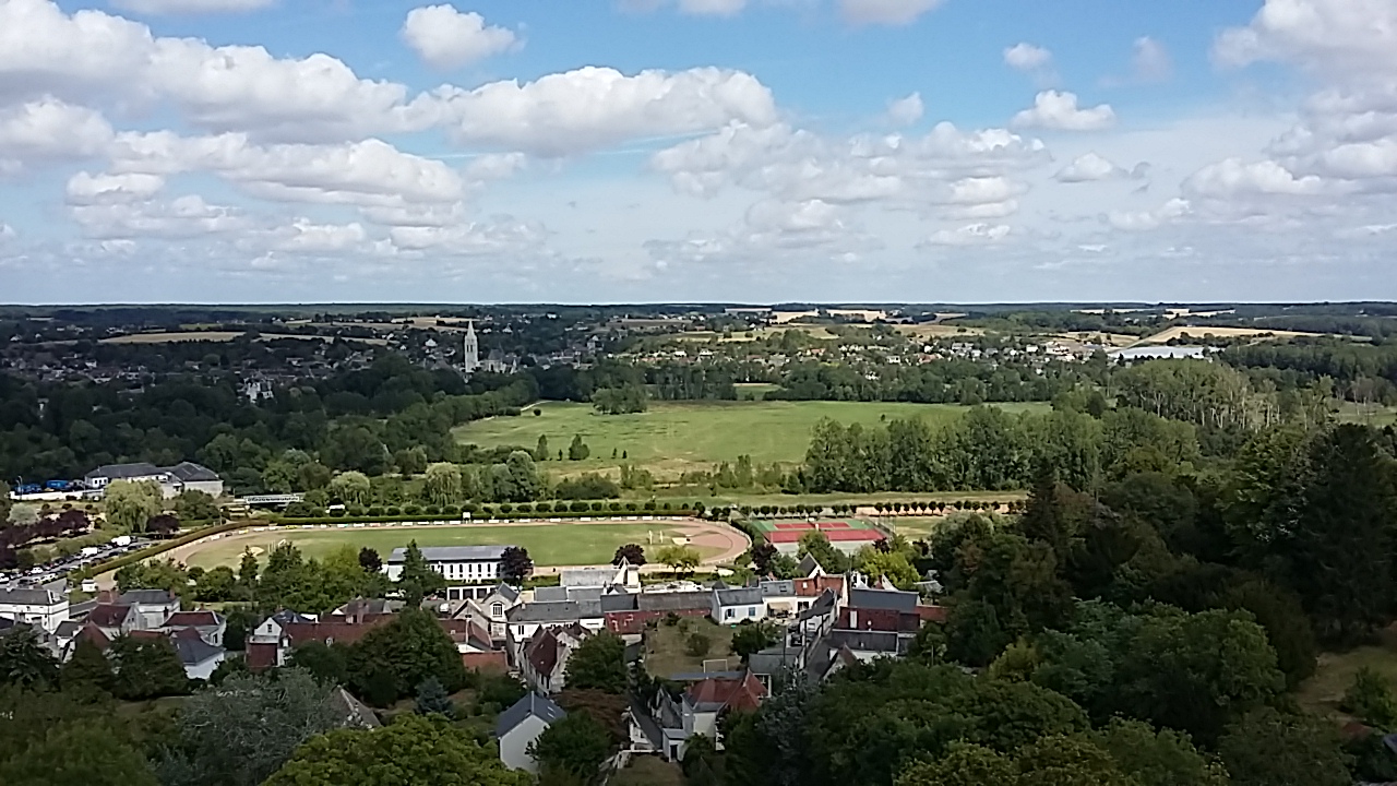 View over fields, woodland and a village in the Indre countryside surrounding the holiday centre