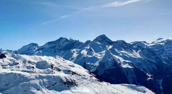 Children skiing on the slopes at Saint-Francois Longchamp