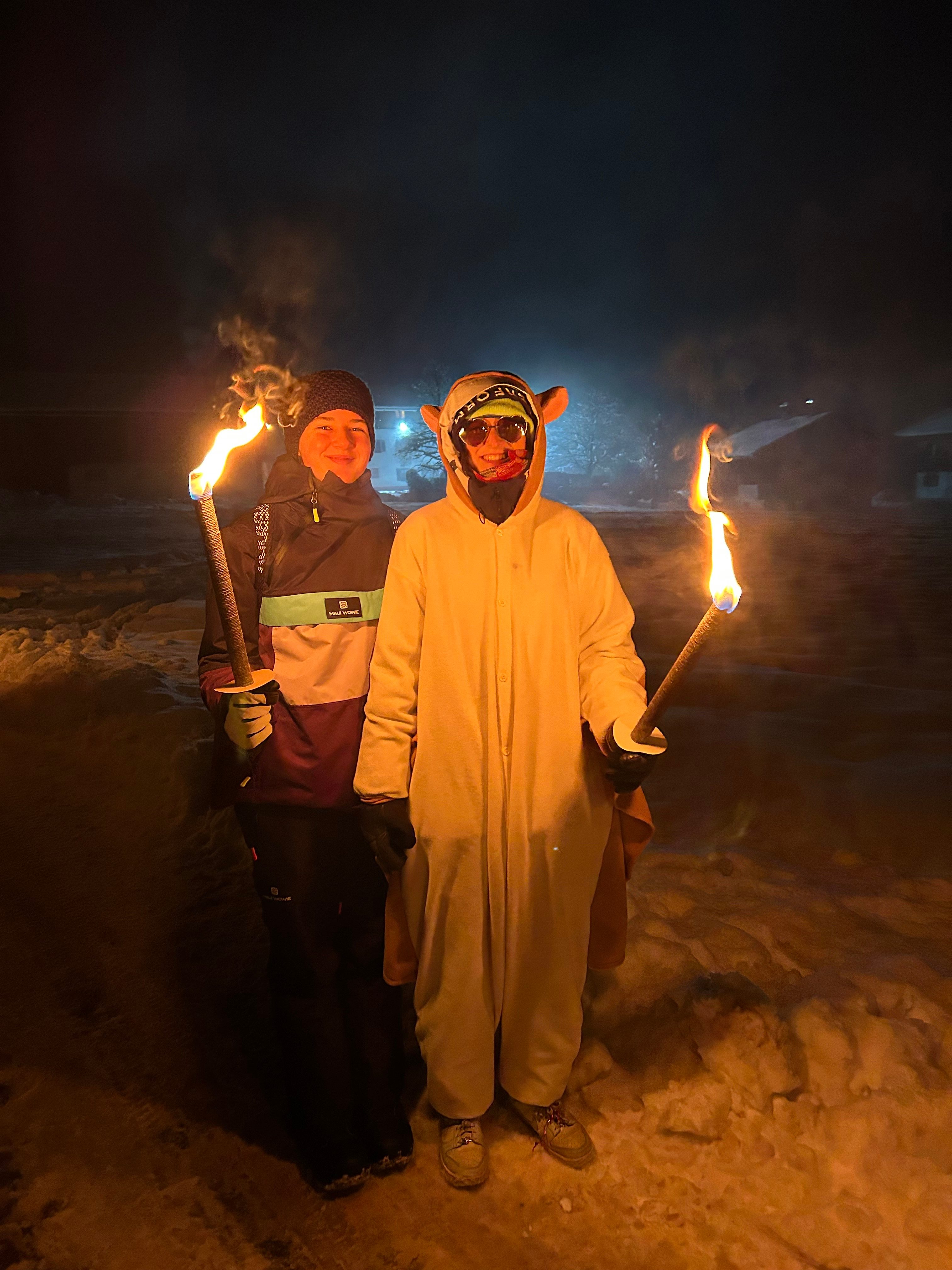 A torchlight walk in St. Johann in Tirol