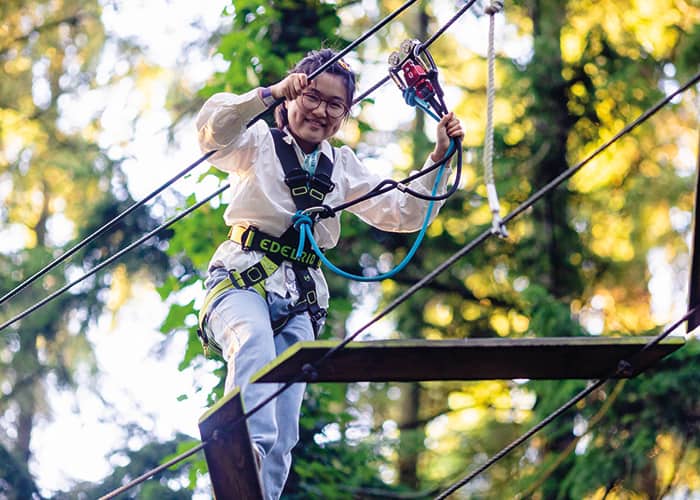 Students taking part in an outdoor adventure sports session at Headington