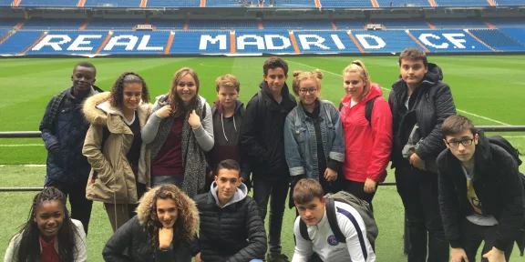 Group in the stands of the Real Madrid stadium during the tour