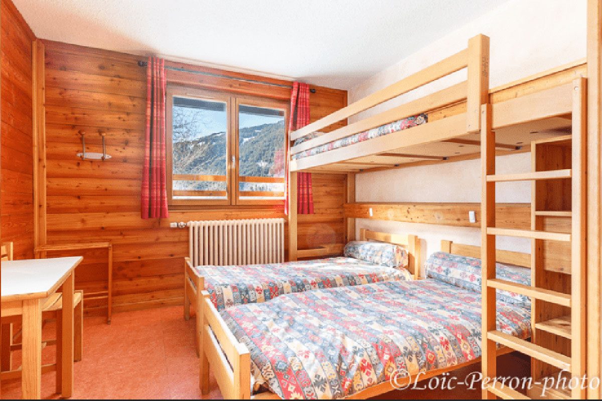 A bedroom at the Chalet l Edelweiss centre, two to six beds with its own bathroom