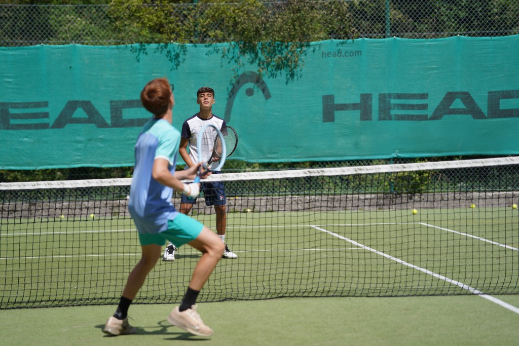 Doubles practice at the camp